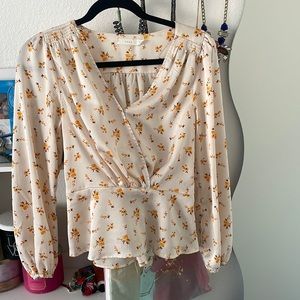 Cream colored top by Lush